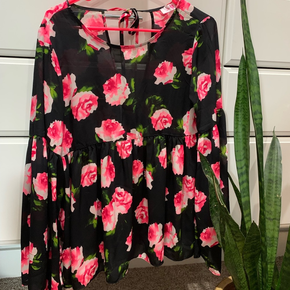 Black floral top with bell sleeves